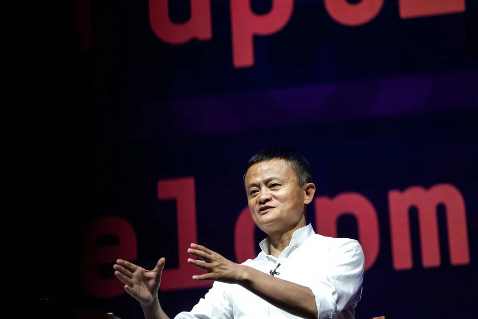 Jack Ma addressing a crowd, showcasing his charismatic leadership style.